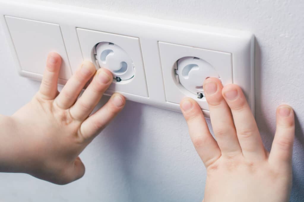 Child safety plugs prevent electrical hazards by protecting young hands from touching wall electrical outlets.