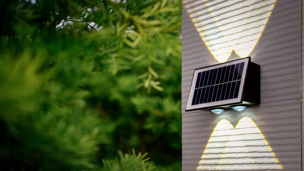 Close-up view of an outdoor lighting LED waterproof solar lamp with a motion sensor.