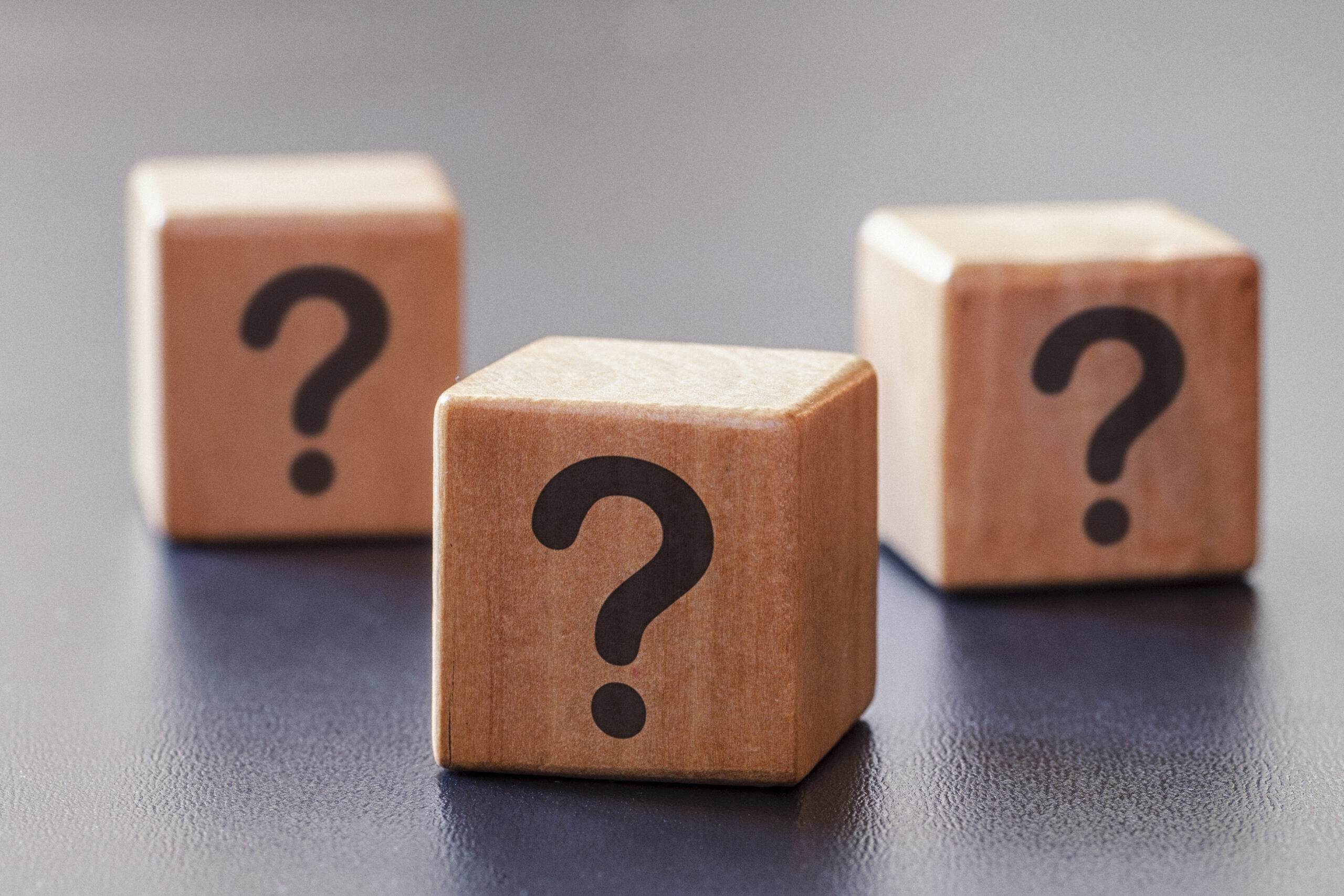 Three wooden blocks with question marks, High-Capacity Electrical Panels.